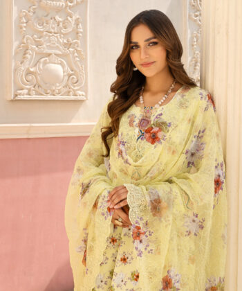 Pakistani woman wearing digital printed lawn shawlar kameez by Ayesha Styles.