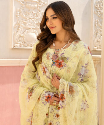 Pakistani woman wearing digital printed lawn shawlar kameez by Ayesha Styles.