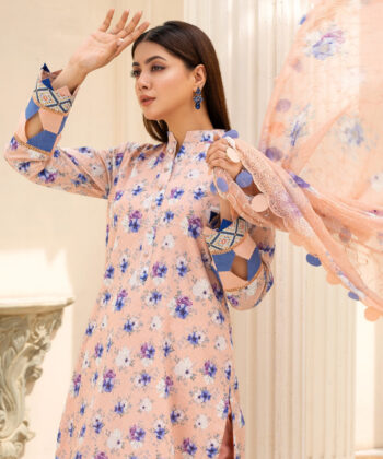 Pakistani woman wearing digital printed lawn shawlar kameez by Ayesha Styles.